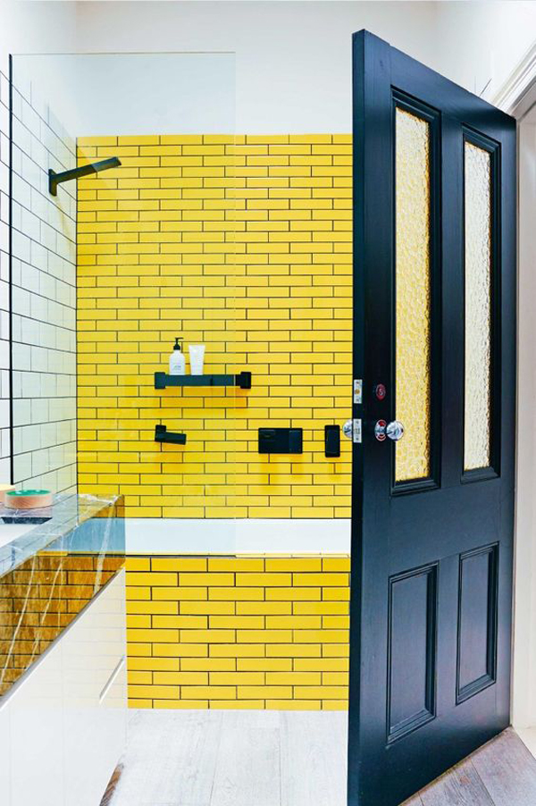 Yellow-bathroom-and-black-door