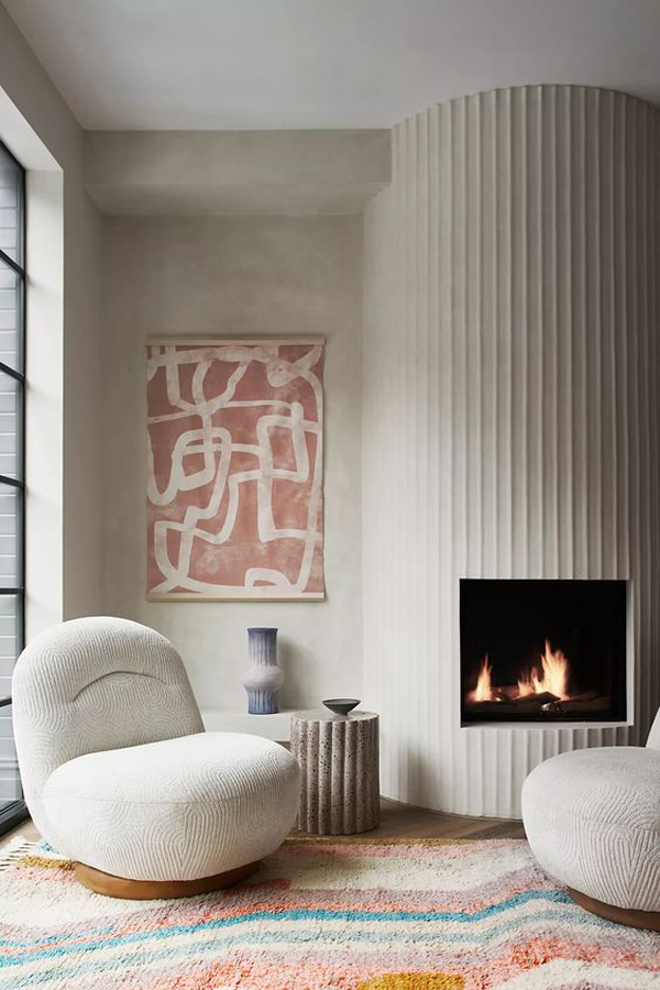 Simple-fireplace-and-abstract-wall-art