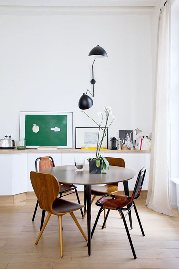 Stylish-round-dining-table-and-funny-decor