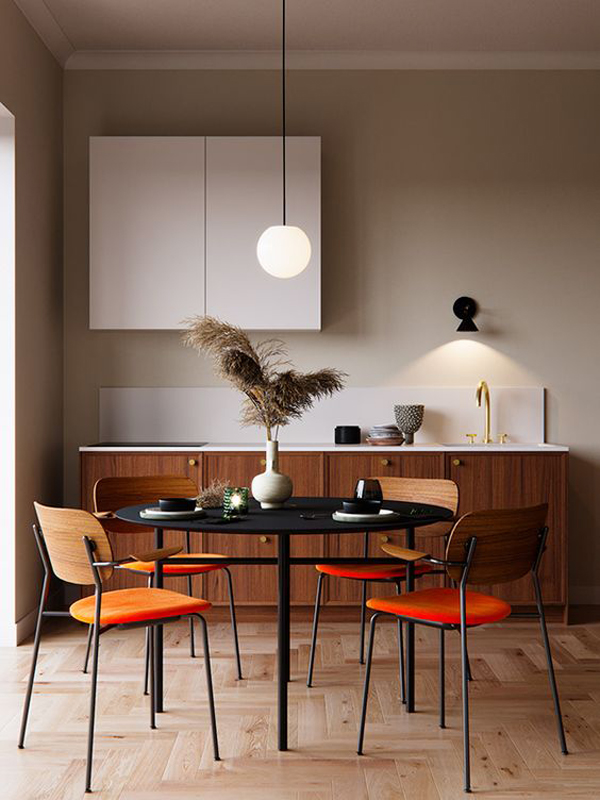 Unique-dining-table-set-with-black-and-orange-theme