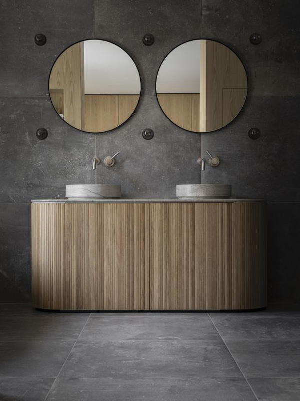 Bathroom-and-a-round-mirror